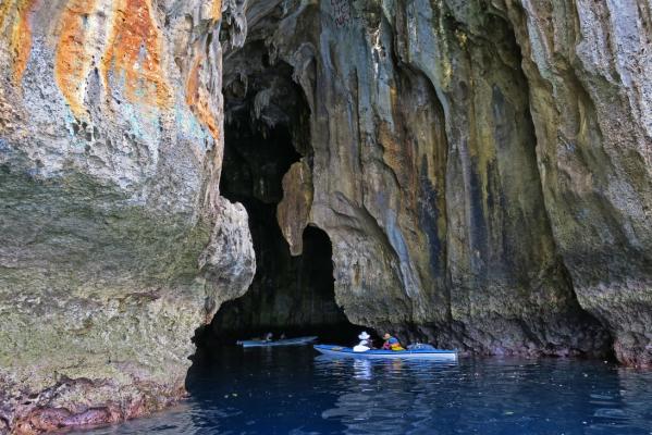 Photographer: Glenn Ord Kayaking in a Cave
